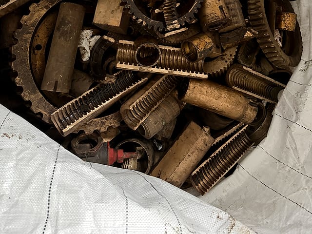 Machined gunmetal gears, worm drives and bushes in a bulk bag